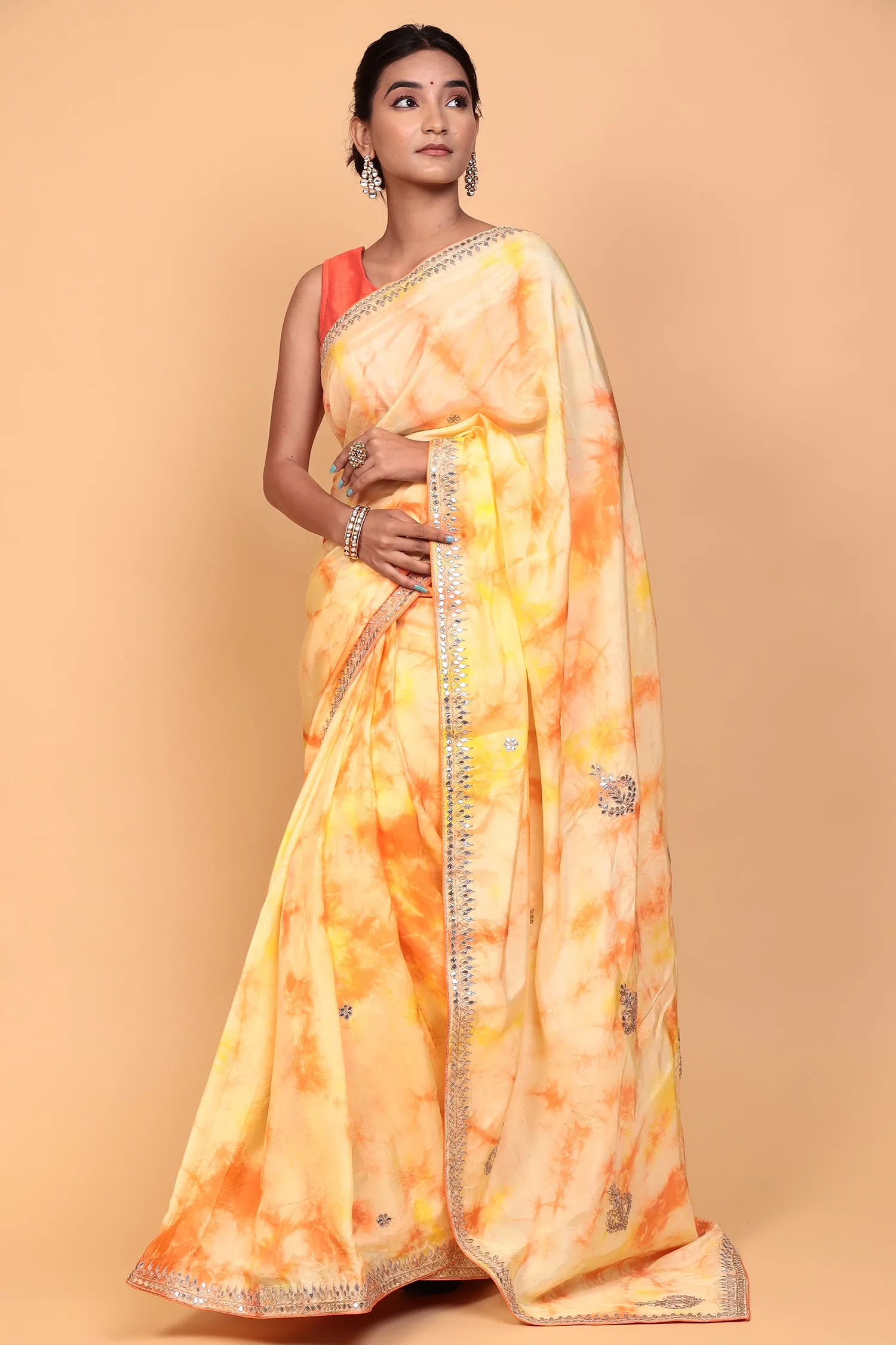 Crepe silk Saree with Gota Patti, Tie & Dye work.