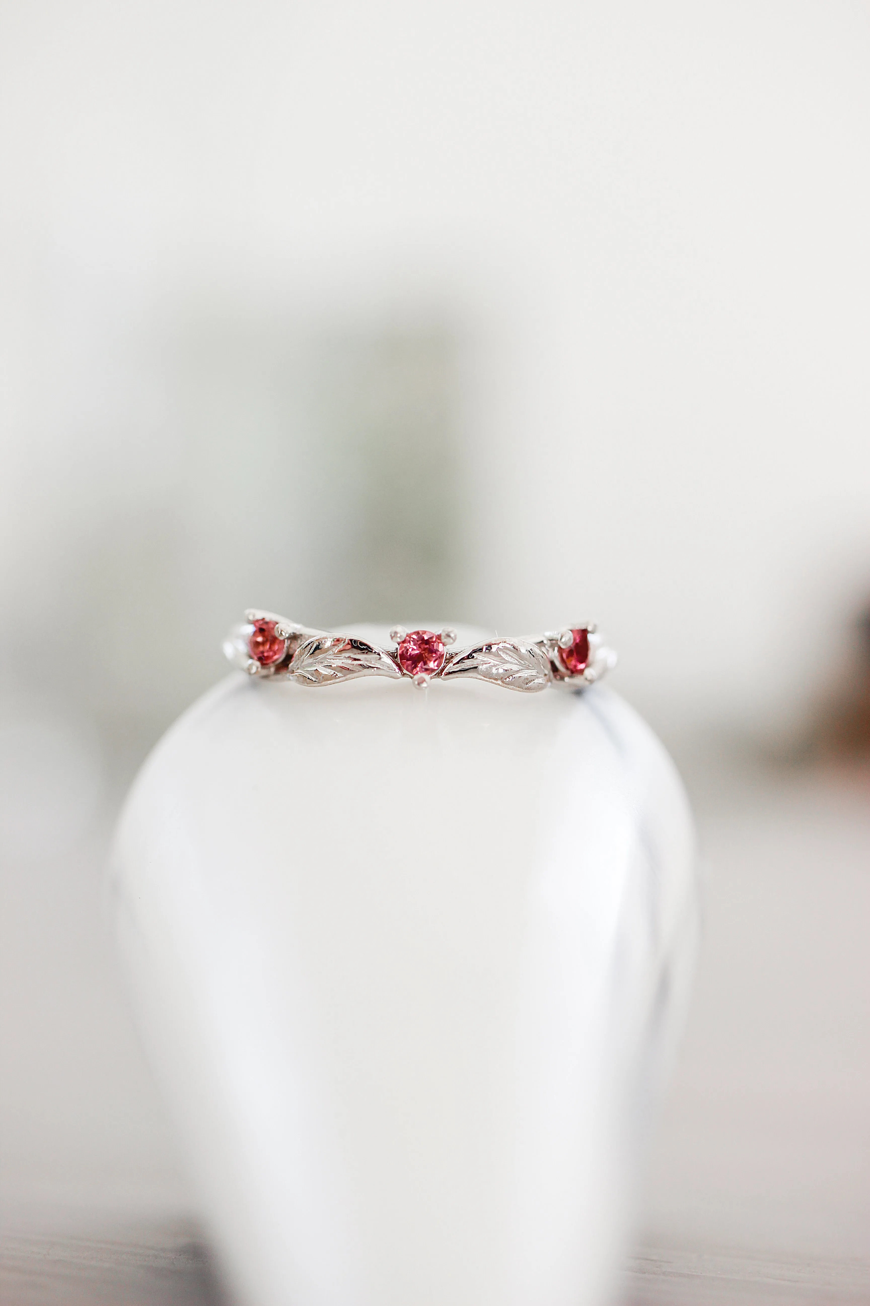 Three pink tourmalines wedding band